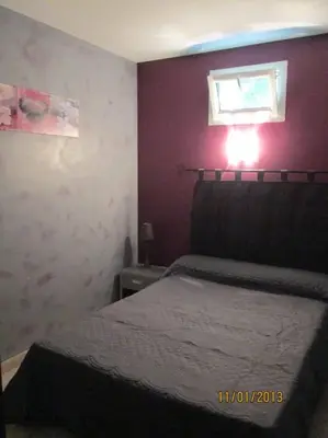 Un ou plusieurs lits dans un hébergement de l'établissement Gîte en bord d'étang et de rivière