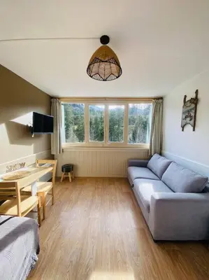 Coin salon dans l'établissement Appartement résidence le bec de l’aigle