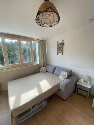 Coin salon dans l'établissement Appartement résidence le bec de l’aigle