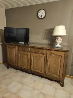 Télévision ou salle de divertissement dans l'établissement Maison la vigne haute