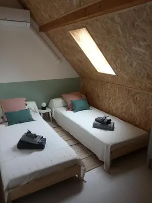 Un ou plusieurs lits dans un hébergement de l'établissement Gîte La Forge proche Rocamadour, Padirac