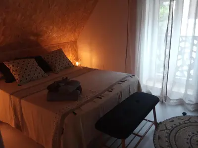 Un ou plusieurs lits dans un hébergement de l'établissement Gîte La Forge proche Rocamadour, Padirac