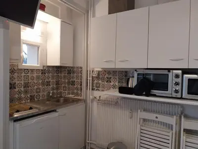 Cuisine ou kitchenette dans l'établissement Studio La Bourboule