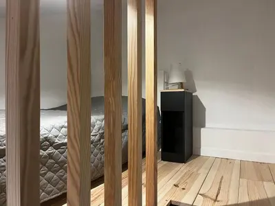 Un ou plusieurs lits dans un hébergement de l'établissement Gîte au bord du lac