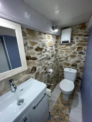 Salle de bains dans l'établissement L'Albizia