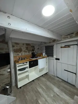 Cuisine ou kitchenette dans l'établissement L'Albizia