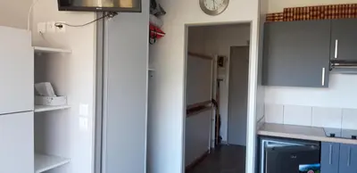 Cuisine ou kitchenette dans l'établissement Studio-cabine Station de ski Super Lioran