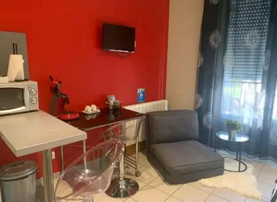 Télévision ou salle de divertissement dans l'établissement Escal Evasion