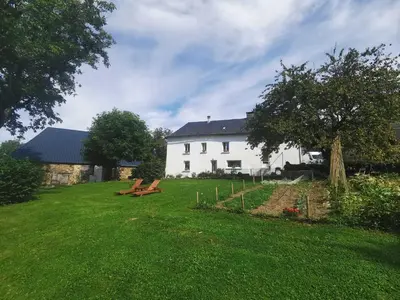Jardin de l'établissement Gîte dans ancien corps de ferme à côté de Pompadour