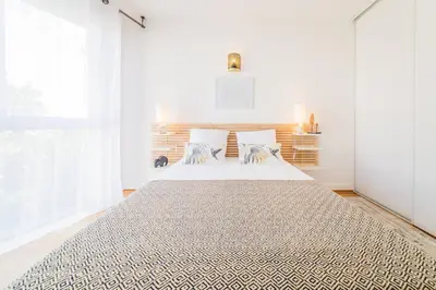 Un ou plusieurs lits dans un hébergement de l'établissement Picasso & Terrasse - 2 Chambres