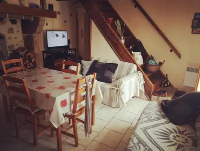 Télévision ou salle de divertissement dans l'établissement Maison dans un havre de paix
