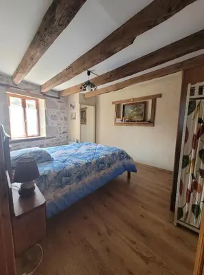Un ou plusieurs lits dans un hébergement de l'établissement Maison dans un havre de paix