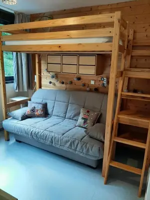 Un ou plusieurs lits dans un hébergement de l'établissement Studio 19 m2 à louer au Mont-Dore