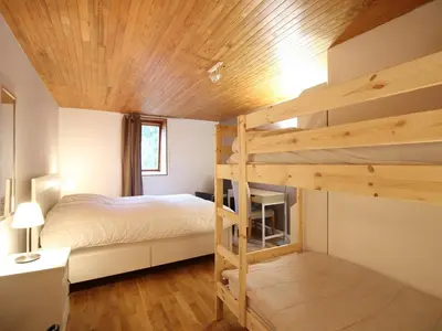 Un ou plusieurs lits dans un hébergement de l'établissement Duplex au Mont-Dore avec parking, proche centre et pistes - FR-1-608-268