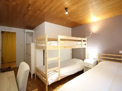 Un ou plusieurs lits dans un hébergement de l'établissement Duplex au Mont-Dore avec parking, proche centre et pistes - FR-1-608-268