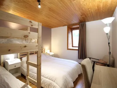 Un ou plusieurs lits dans un hébergement de l'établissement Duplex au Mont-Dore avec parking, proche centre et pistes - FR-1-608-268