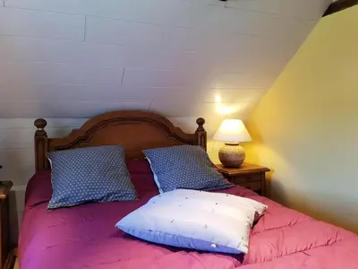 Un ou plusieurs lits dans un hébergement de l'établissement Gîte de France Le fournil des prades 2 épis - Gîte de France 2 personnes MAE-6414