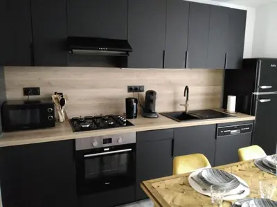 Cuisine ou kitchenette dans l'établissement Location saisonnière La Berbère