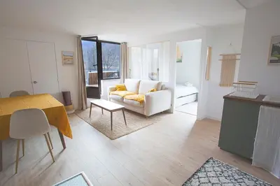 Coin salon dans l'établissement Le Nid Slow - Appartement avec Terrasse Panoramique sur le Sancy