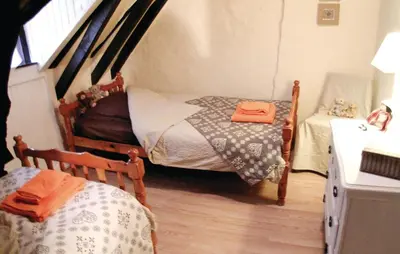 Un ou plusieurs lits dans un hébergement de l'établissement Awesome Home In Granges D'ans