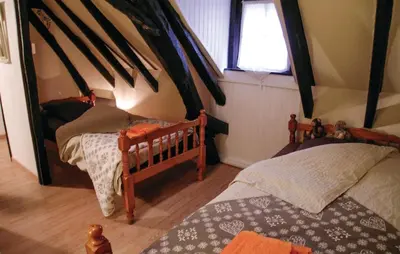 Un ou plusieurs lits dans un hébergement de l'établissement Awesome Home In Granges D'ans