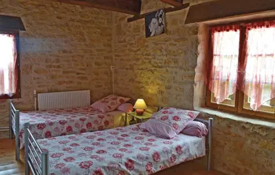 Un ou plusieurs lits dans un hébergement de l'établissement Stunning Home In La-Chapelle-Saint-Jean