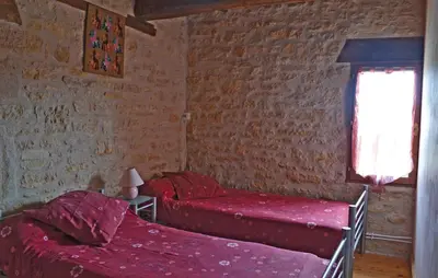 Un ou plusieurs lits dans un hébergement de l'établissement Stunning Home In La-Chapelle-Saint-Jean