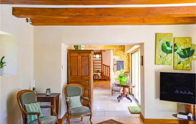 Télévision ou salle de divertissement dans l'établissement Cozy Home In La Cassagne