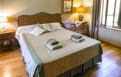 Un ou plusieurs lits dans un hébergement de l'établissement Cozy Home In La Cassagne