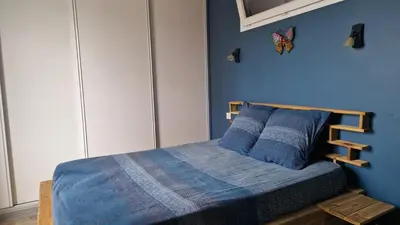 Un ou plusieurs lits dans un hébergement de l'établissement Le gîte de La Tête de l'Art