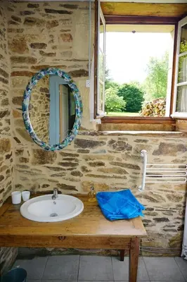 Salle de bains dans l'établissement L'Atelier