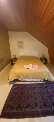 Un ou plusieurs lits dans un hébergement de l'établissement Belle maison ancienne bien équipée avec vue
