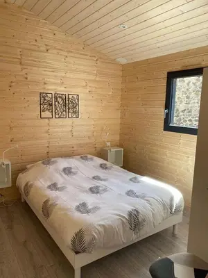 Un ou plusieurs lits dans un hébergement de l'établissement Le chalet de Coheix