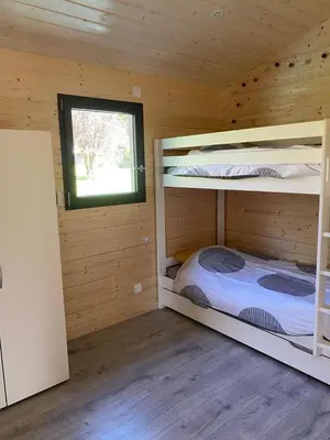 Un ou plusieurs lits dans un hébergement de l'établissement Le chalet de Coheix