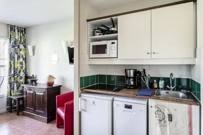 Cuisine ou kitchenette dans l'établissement Le meilleur des Belles Rives Immozen46