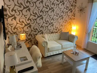 Coin salon dans l'établissement B&B Le Saut de la Bergère