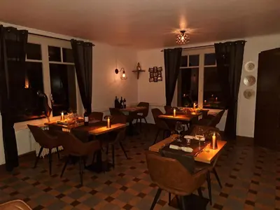 Restaurant ou autre lieu de restauration dans l'établissement B&B Le Saut de la Bergère