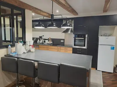 Cuisine ou kitchenette dans l'établissement Ferme auvergnate
