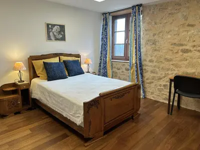 Un ou plusieurs lits dans un hébergement de l'établissement La murette
