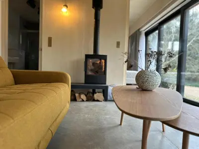 Coin salon dans l'établissement Lodge 5 étoiles - Home Chic dans les prés