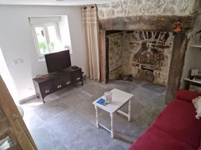 Télévision ou salle de divertissement dans l'établissement Au pied du Frêne