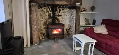 Coin salon dans l'établissement Au pied du Frêne