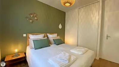 Un ou plusieurs lits dans un hébergement de l'établissement Appart 'Hôtel BreakIsleBed Limoges CHU & Fac Médecine Pharma à Pied parking gratuit