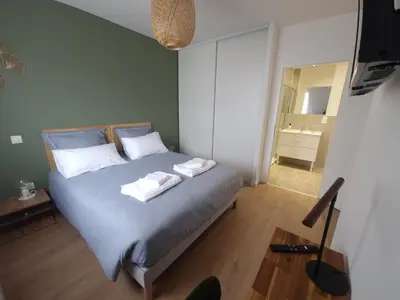 Un ou plusieurs lits dans un hébergement de l'établissement Appart 'Hôtel BreakIsleBed Limoges CHU & Fac Médecine Pharma à Pied parking gratuit