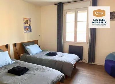 Un ou plusieurs lits dans un hébergement de l'établissement Appartement climatisé avec sa terrasse de 25 M2