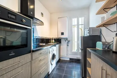 Cuisine ou kitchenette dans l'établissement Le Cocon Urbain, Hyper centre-Vaste-Lumineux