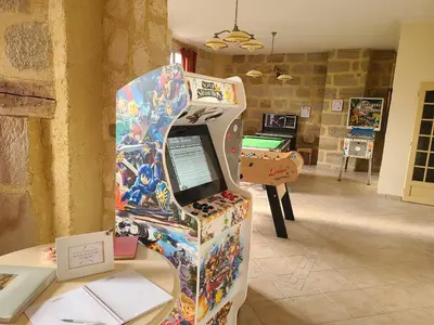 Salle de jeux dans l'établissement Les Dépendances du Château