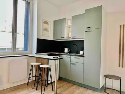 Cuisine ou kitchenette dans l'établissement Studio moderne/rue Encombe Vineuse- DABNB