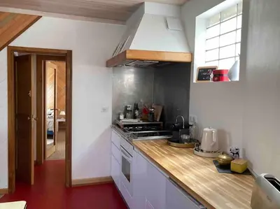 Cuisine ou kitchenette dans l'établissement Villanelle maison en centre hyper calme et au vert