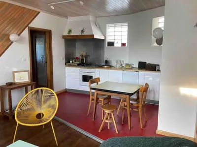 Cuisine ou kitchenette dans l'établissement Maison centre hyper calme au vert